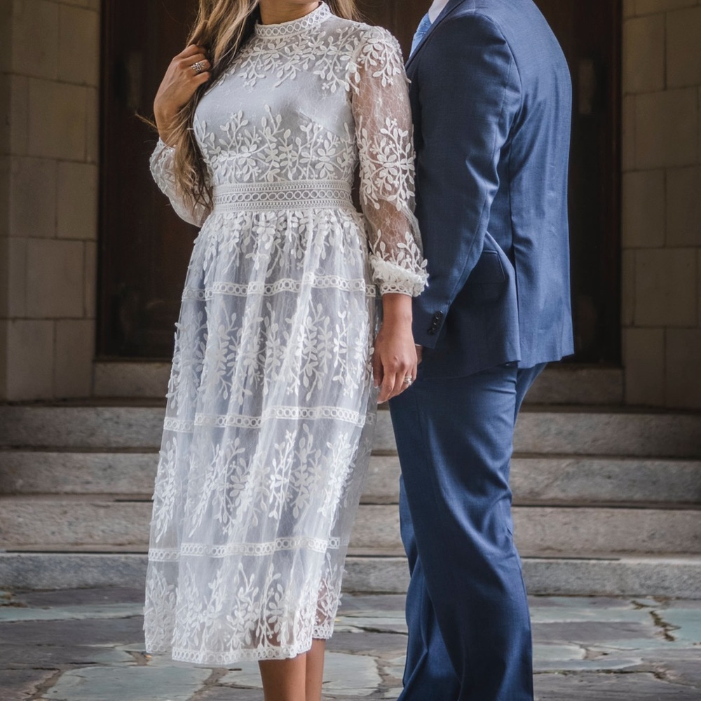 Sicily Ivy City Co. Gorgeous dress and the sleeves are stunning!